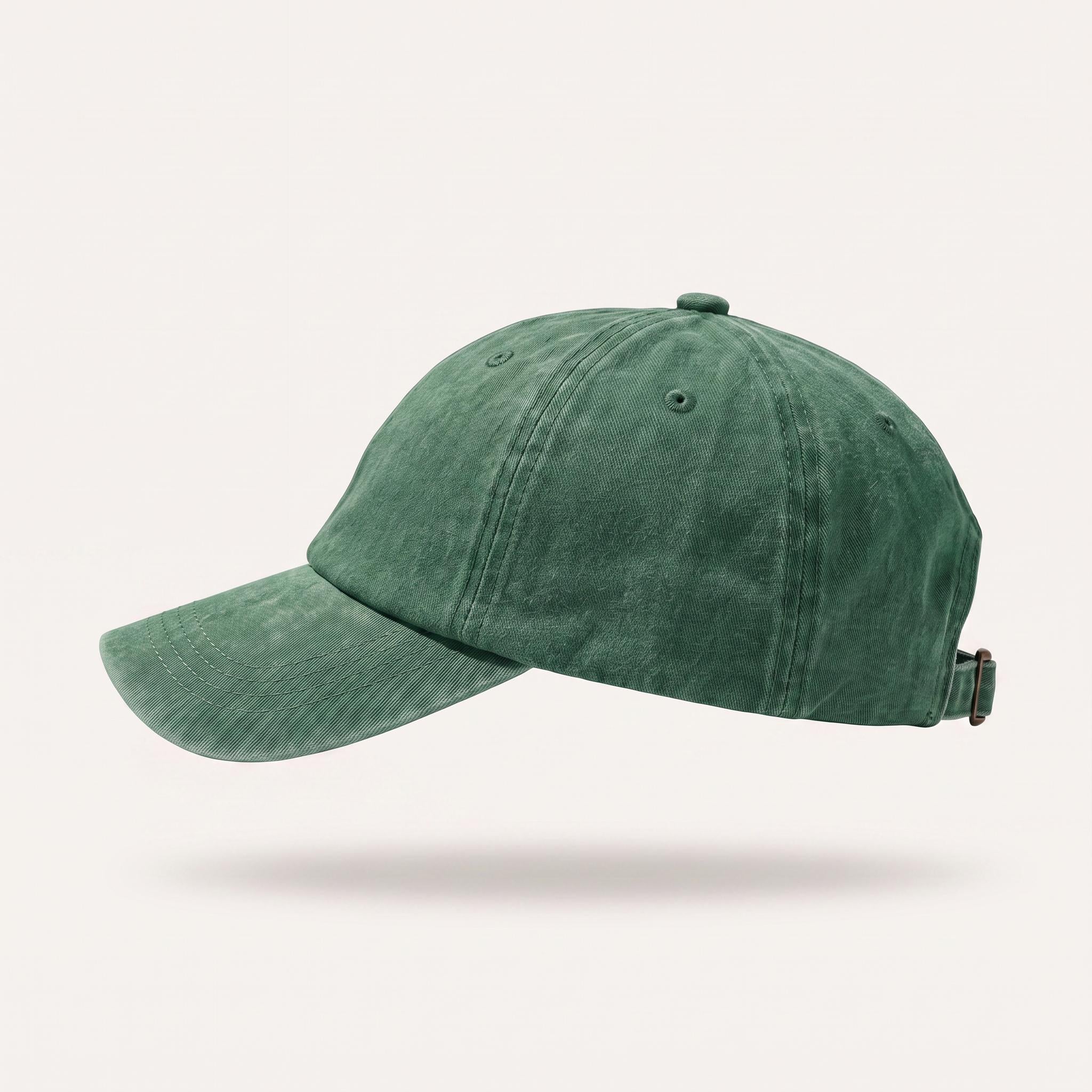 A washed dark gray baseball cap shown from a side profile against a light beige background.