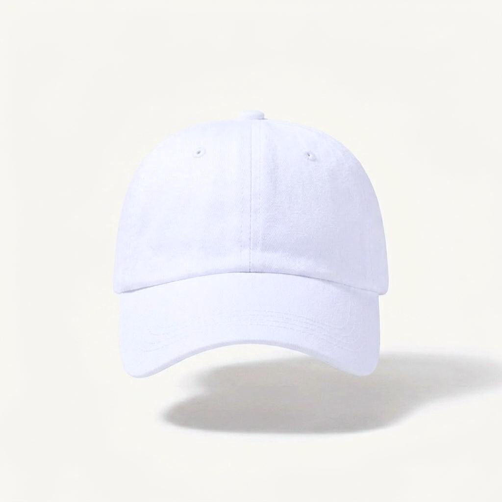A plain white baseball cap shown from the front on a light cream background with a soft shadow underneath.