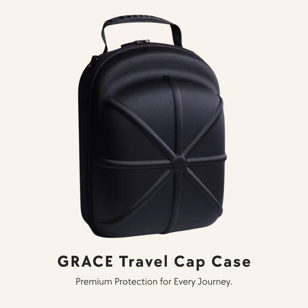 A black hard-shell travel cap case with a top handle, shown on a light beige background with the text 'GRACE Travel Cap Case' and 'Premium Protection for Every Journey.' below it.