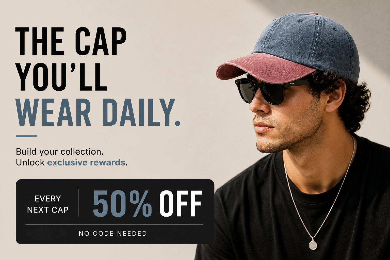 A promotional banner featuring a man in profile wearing a blue denim cap with a dusty pink brim, black sunglasses, and a black t-shirt. The left side contains text reading 'THE CAP YOU'LL WEAR DAILY.