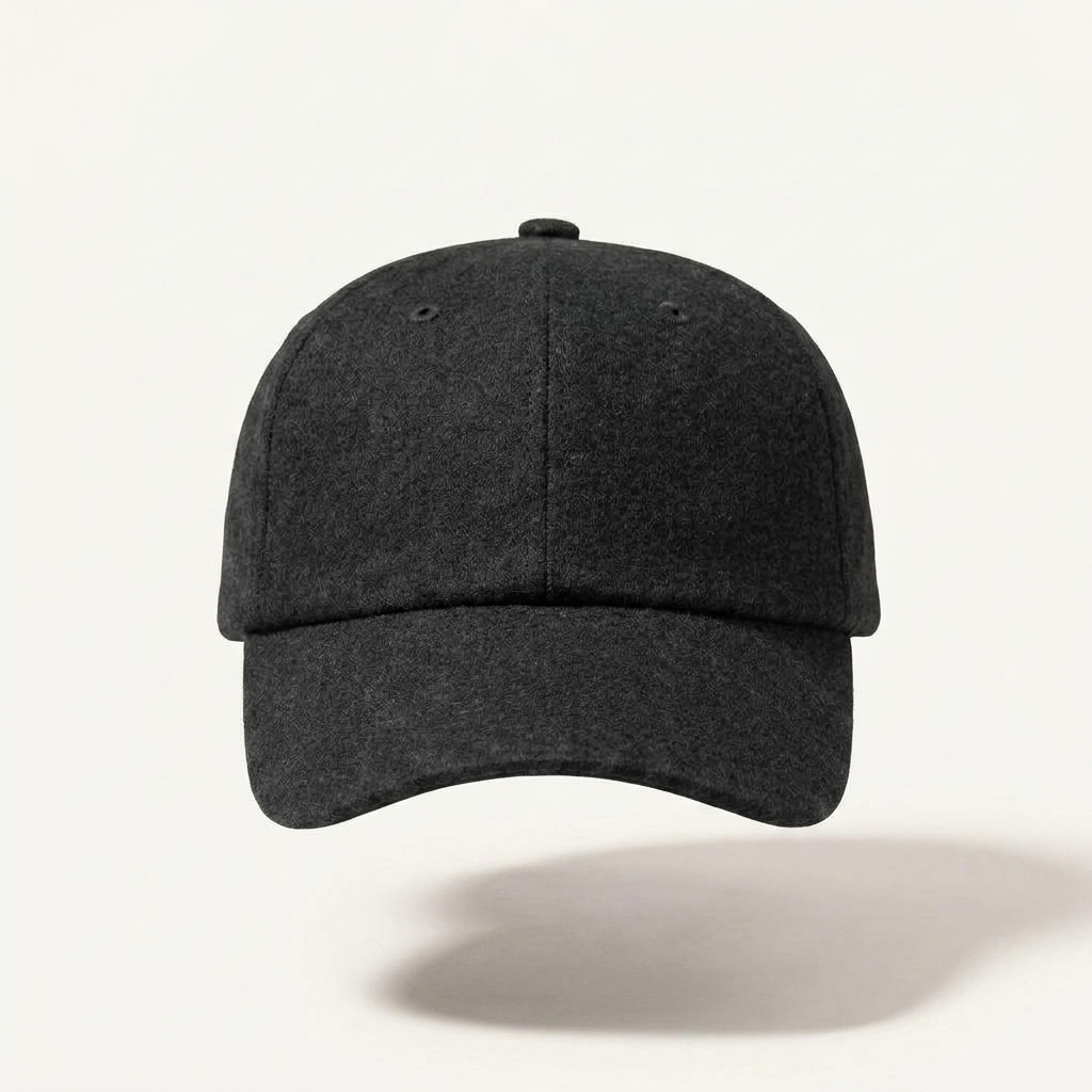 A dark charcoal gray baseball cap with a curved brim, shown from a front-facing perspective against a clean off-white background with a soft shadow underneath.