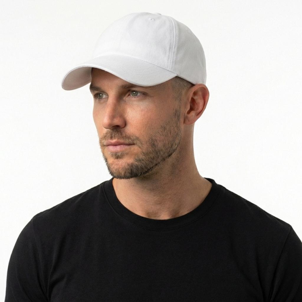 Man wearing a white cap and black shirt on a white background